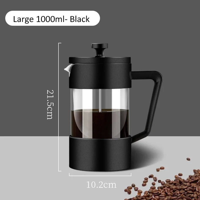 Black French press with coffee and coffee beans on a gray background