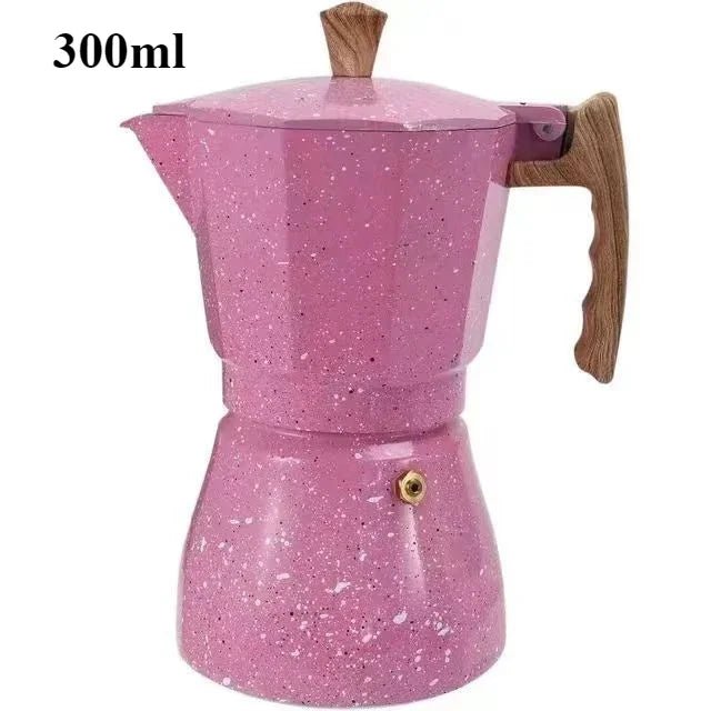 Pink speckled espresso pot with wooden handle and lid on a white background