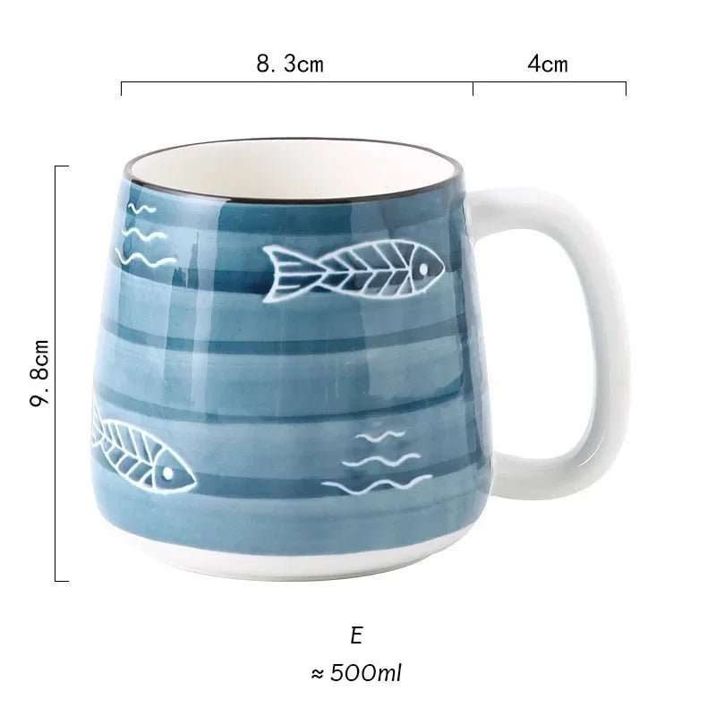 Blue ceramic mug with fish and wave patterns, dimensions shown