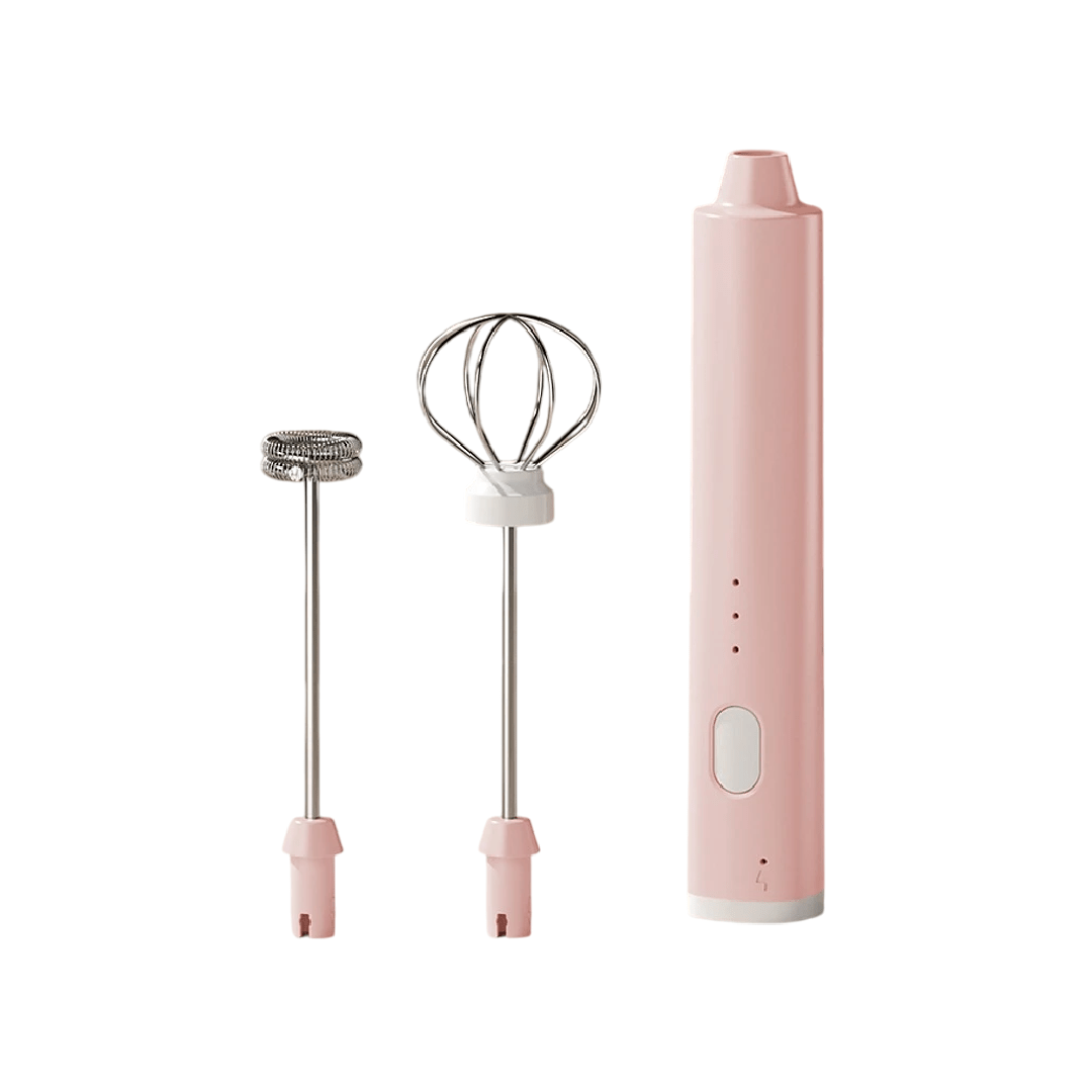 Pink handheld electric mixer with attachments on a white background
