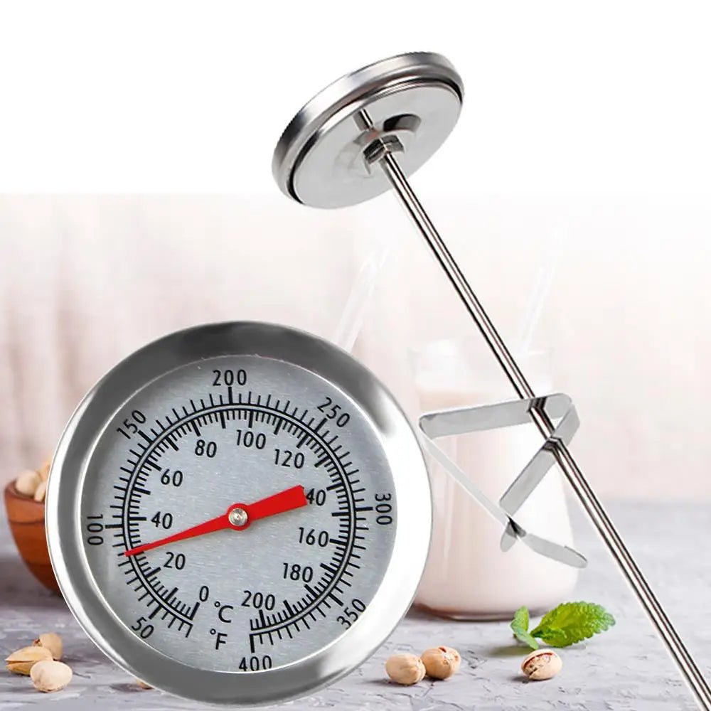 Bimetallic thermometer with a long probe on a white background