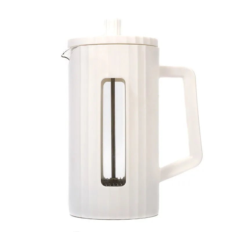 White french press coffee maker with a handle on a white background