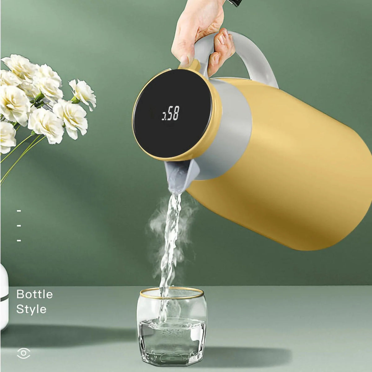 Yellow Thermal Coffee Carafe with digital display pouring water into a glass on a green background