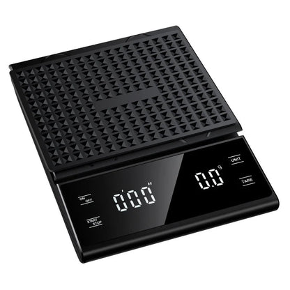 Black digital kitchen scale with textured top and digital display on a white background