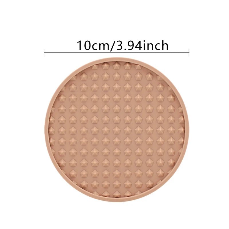 pink silicone coaster on a white background