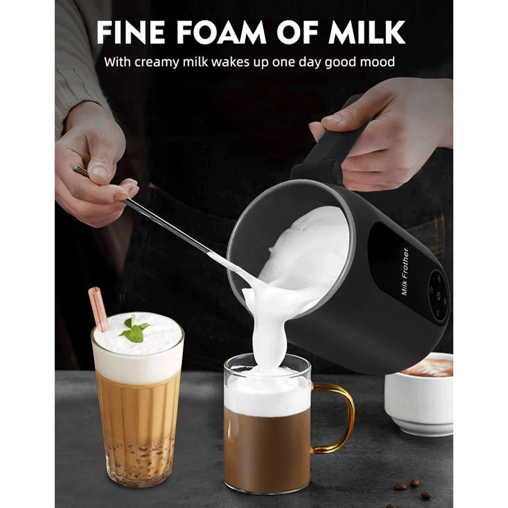 Person making coffee with a milk frother, surrounded by coffee cups and ingredients.