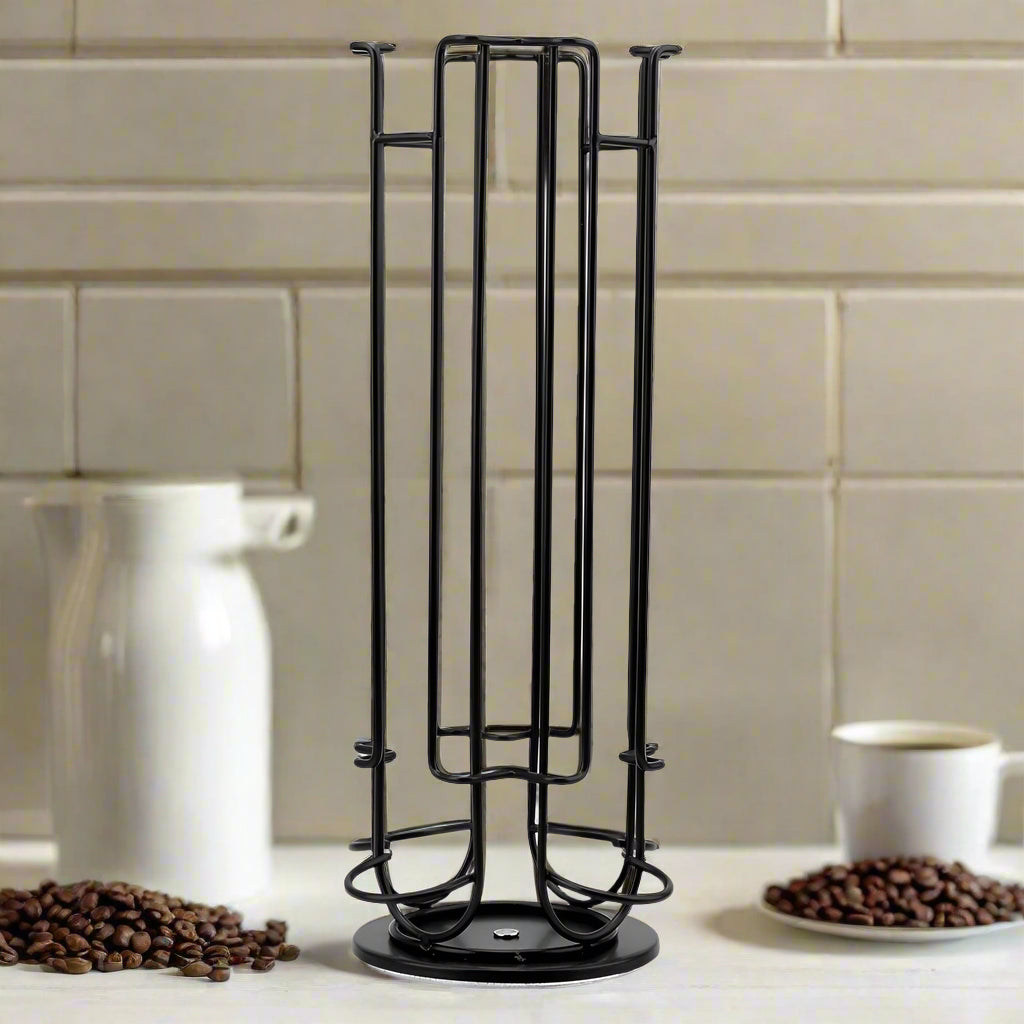 Black metal coffee pot rack on a table