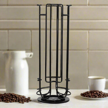 Black metal coffee pot rack on a table