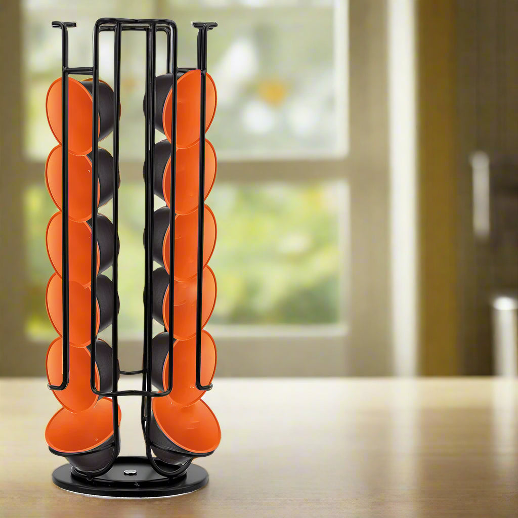 Orange coffee pod holder with black stand on a white background, featuring a cup of coffee and coffee beans illustration.