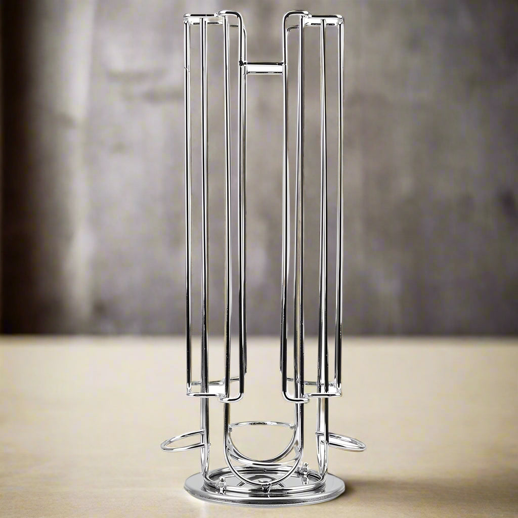 Black metal coffee pot rack on a table