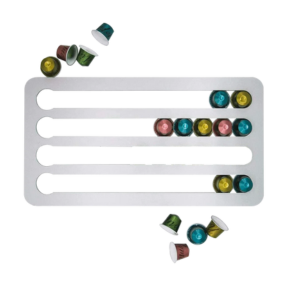 Metallic white holder with colorful coffee capsules on a white background