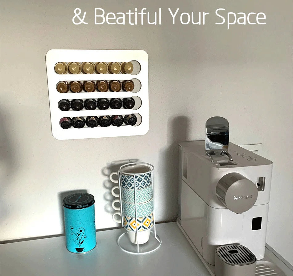 White coffee machine with a wall-mounted rack of coffee pods on a light gray background.
