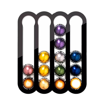 Set of colorful contact lenses in a black case with a white background
