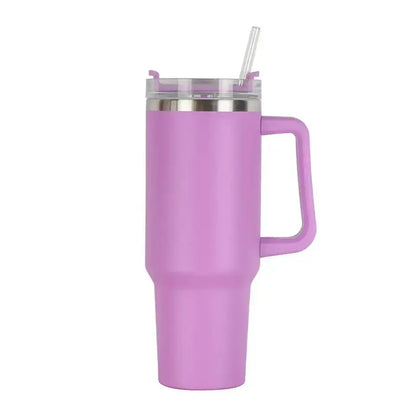 tumbler with handle and straw lid, surrounded on a white background