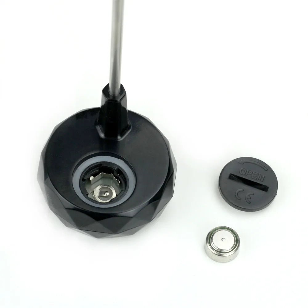 Digital thermometer with a long probe on a white background