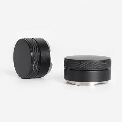 Two black metal coffee tamper on a white background