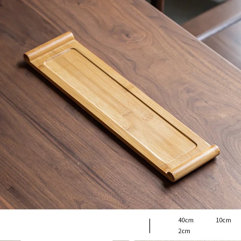 Wooden drawer pull on a wooden surface with measurement labels
