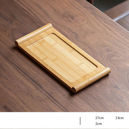 Wooden tray on a wooden surface with dimensions indicated