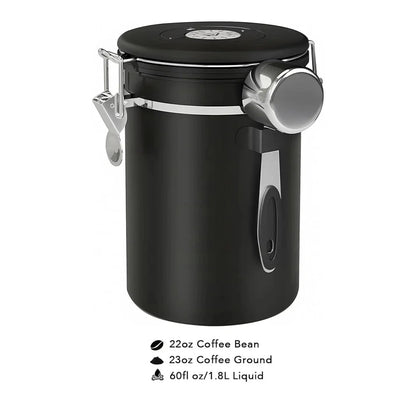 Black coffee canister with measuring scoop on a white background