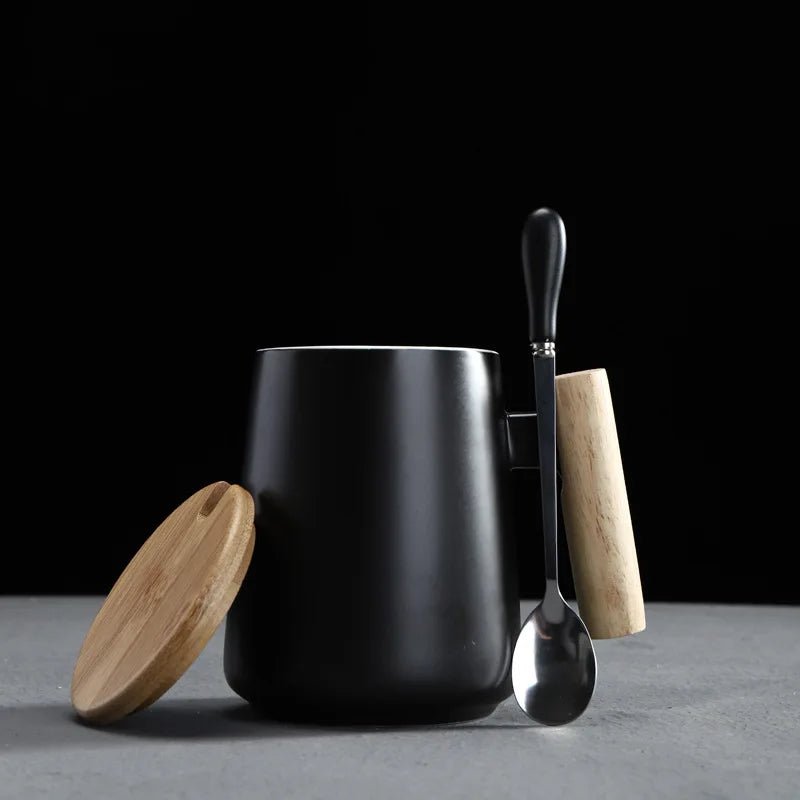 Black mug with wooden lid and spoon on a dark background