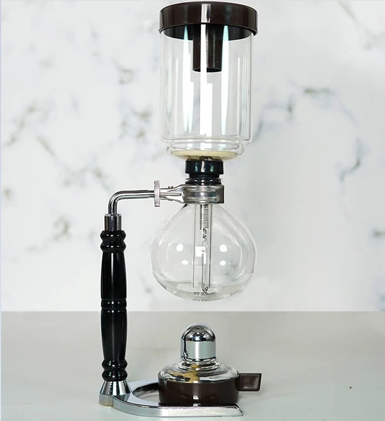 Siphon coffee apparatus on a marble countertop
