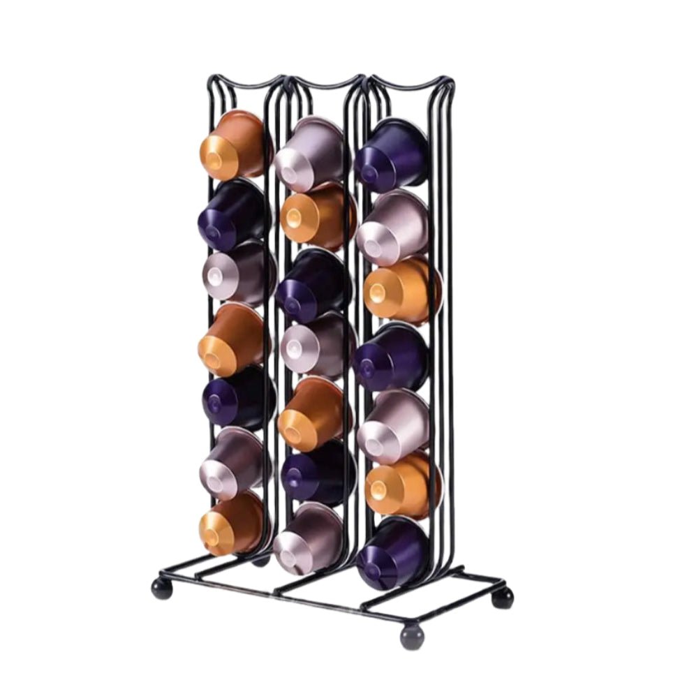 Black wire coffee pod organizer with colorful coffee pods on a white background