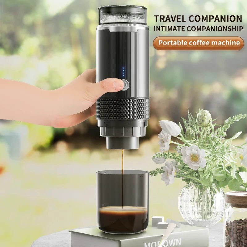 Portable coffee machine being used to make coffee outdoors with flowers in the background