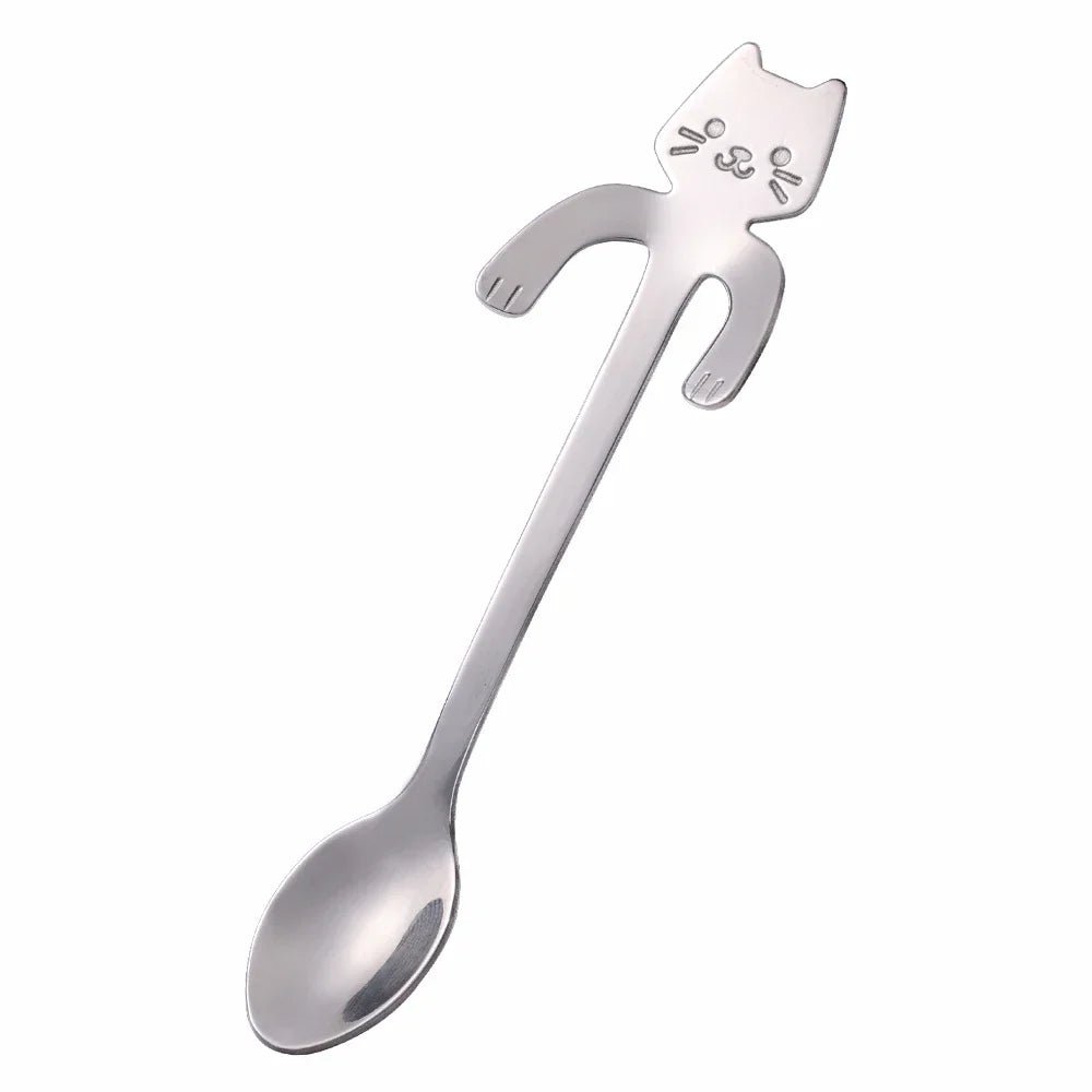Cat-shaped spoon on a white background