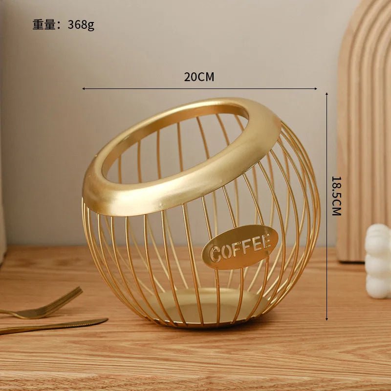 Gold wire basket with 'COFFEE' label on a wooden surface, showing dimensions.