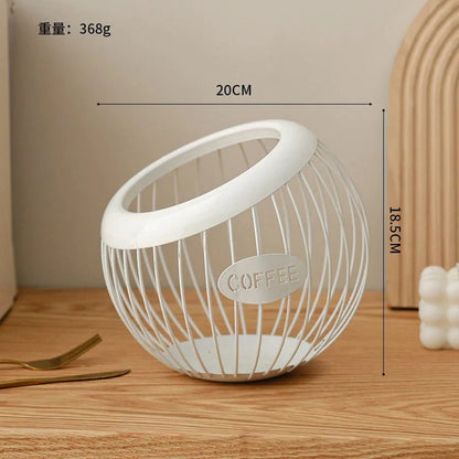 White wire basket with 'COFFEE' label on a wooden surface, showing measurements.