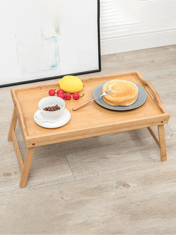 Wooden tray with food on a wooden floor