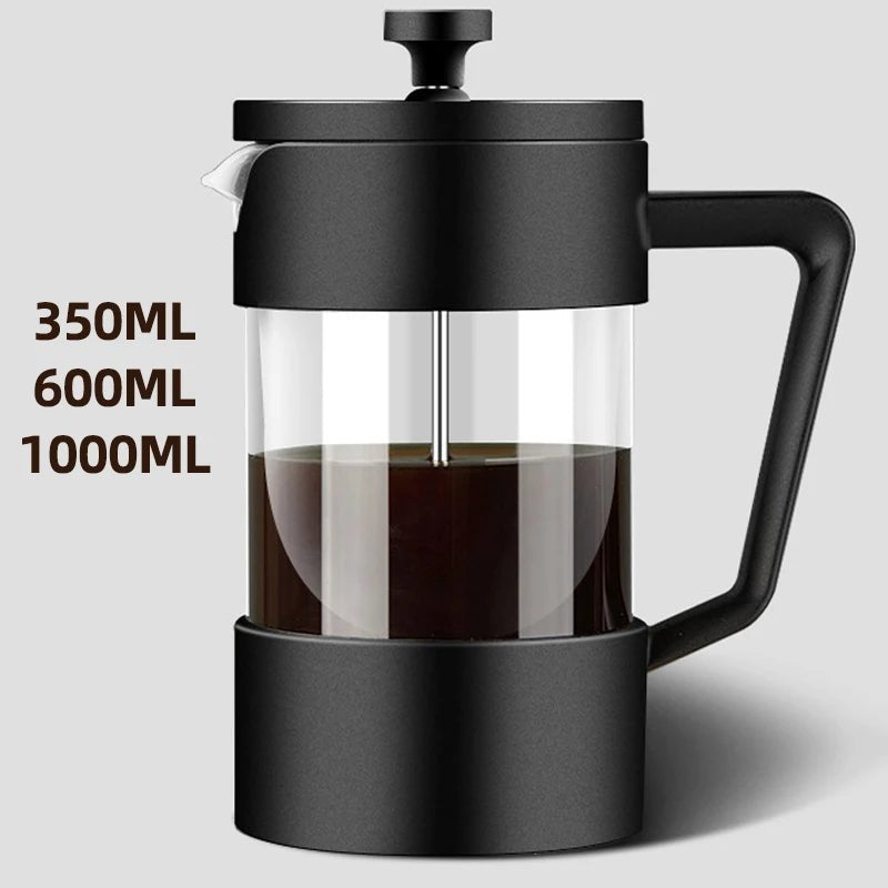 Black French press with coffee and volume markings on a light gray background