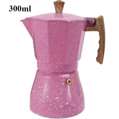 Pink speckled espresso pot with wooden handle and lid on a white background