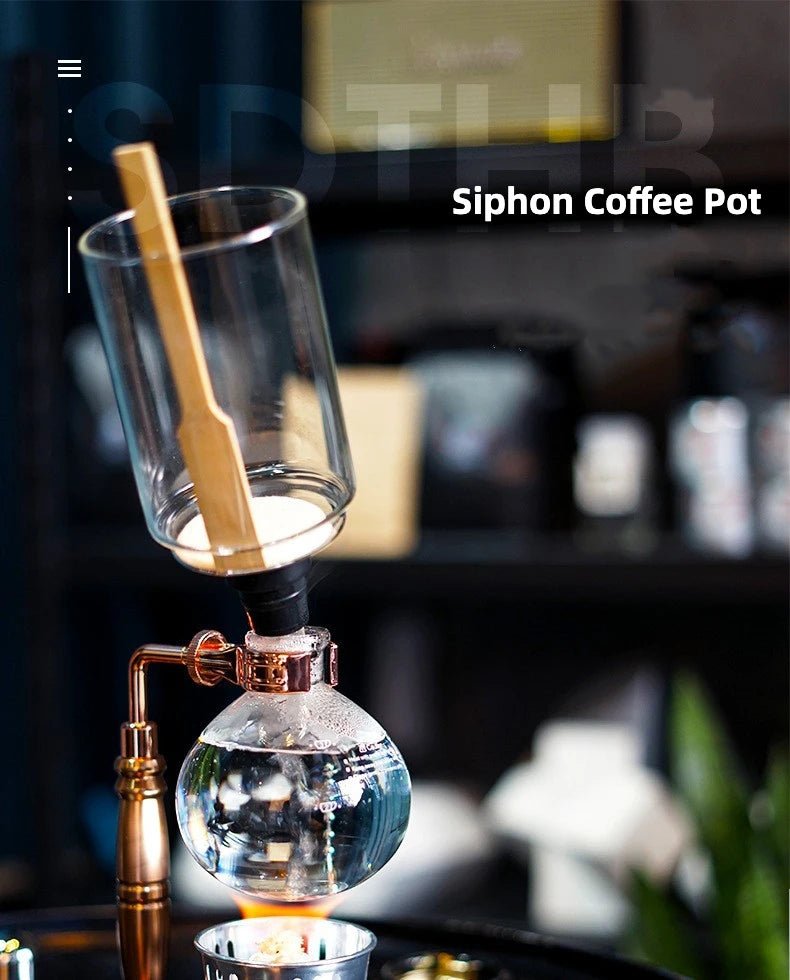 Siphon coffee pot with a wooden scoop on a blurred background