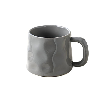 Gray ceramic mug on a white background