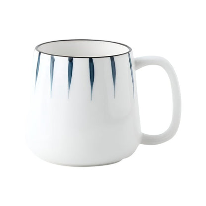White mug with blue stripes on a white background