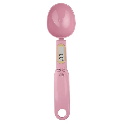Pink digital measuring spoon on a white background