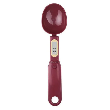 Digital measuring spoon with a red handle on a white background