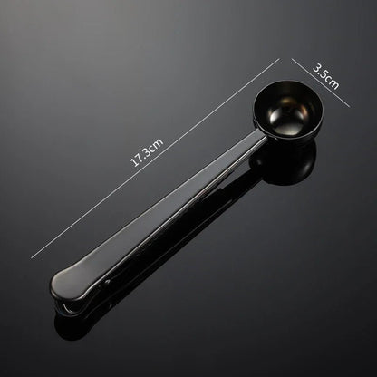 Black measuring spoon with measurements on a dark background