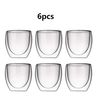 Set of six clear double-walled glass tumblers on a white background