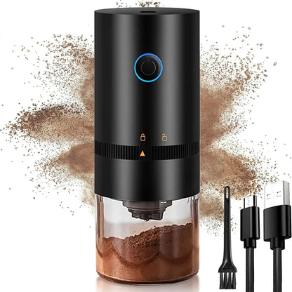 Black coffee grinder with clear container filled with coffee grounds, attachments, and charging cable on a white background.