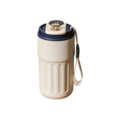 White and navy blue thermos with a strap on a white background