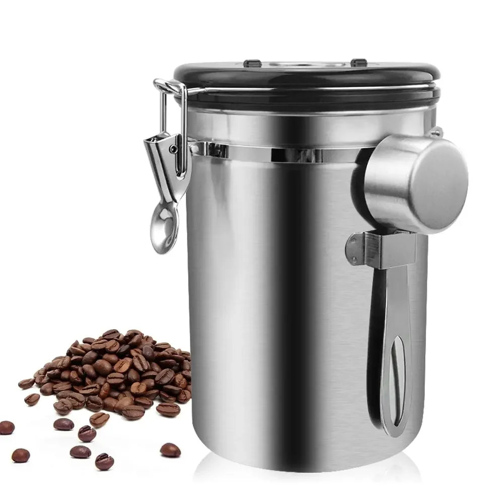 Stainless steel coffee canister with a lid and coffee beans on a white background