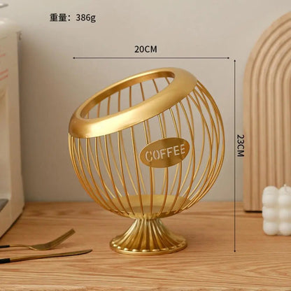 Gold wire coffee basket with 'COFFEE' label on a wooden surface, showing dimensions.