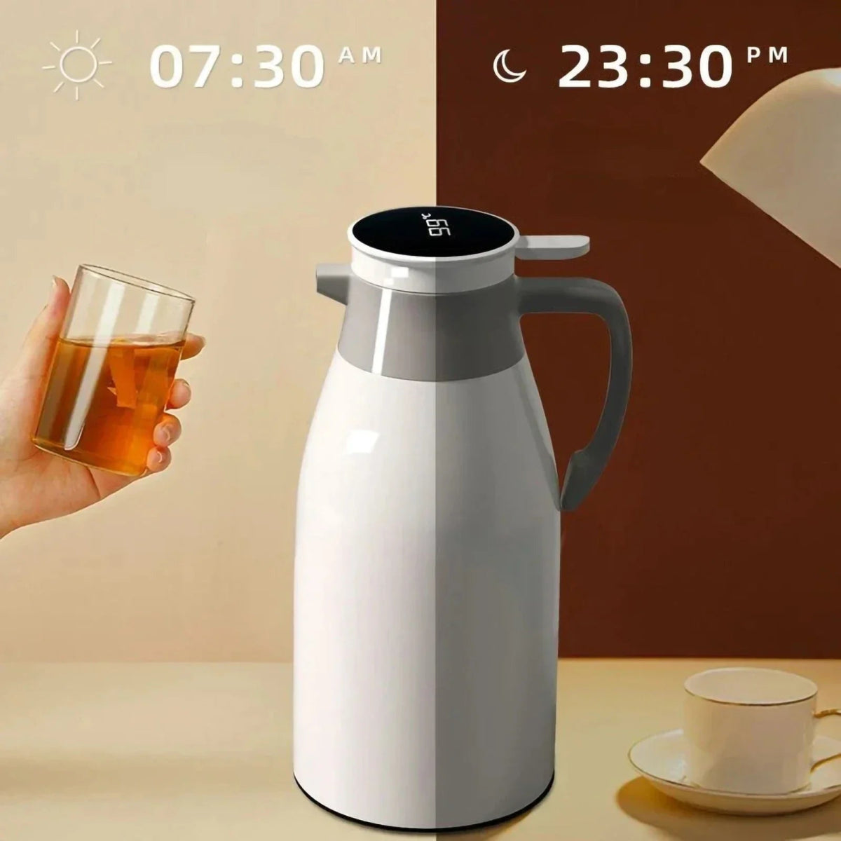 White thermos with digital display, hand holding a glass of tea, and cup on saucer.